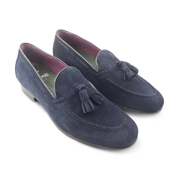 Blue suede bow loafers