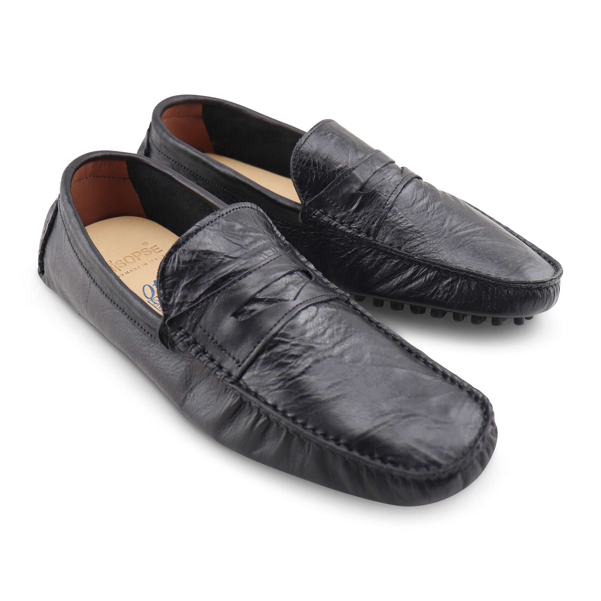 Black rubber soles in crumpled leather