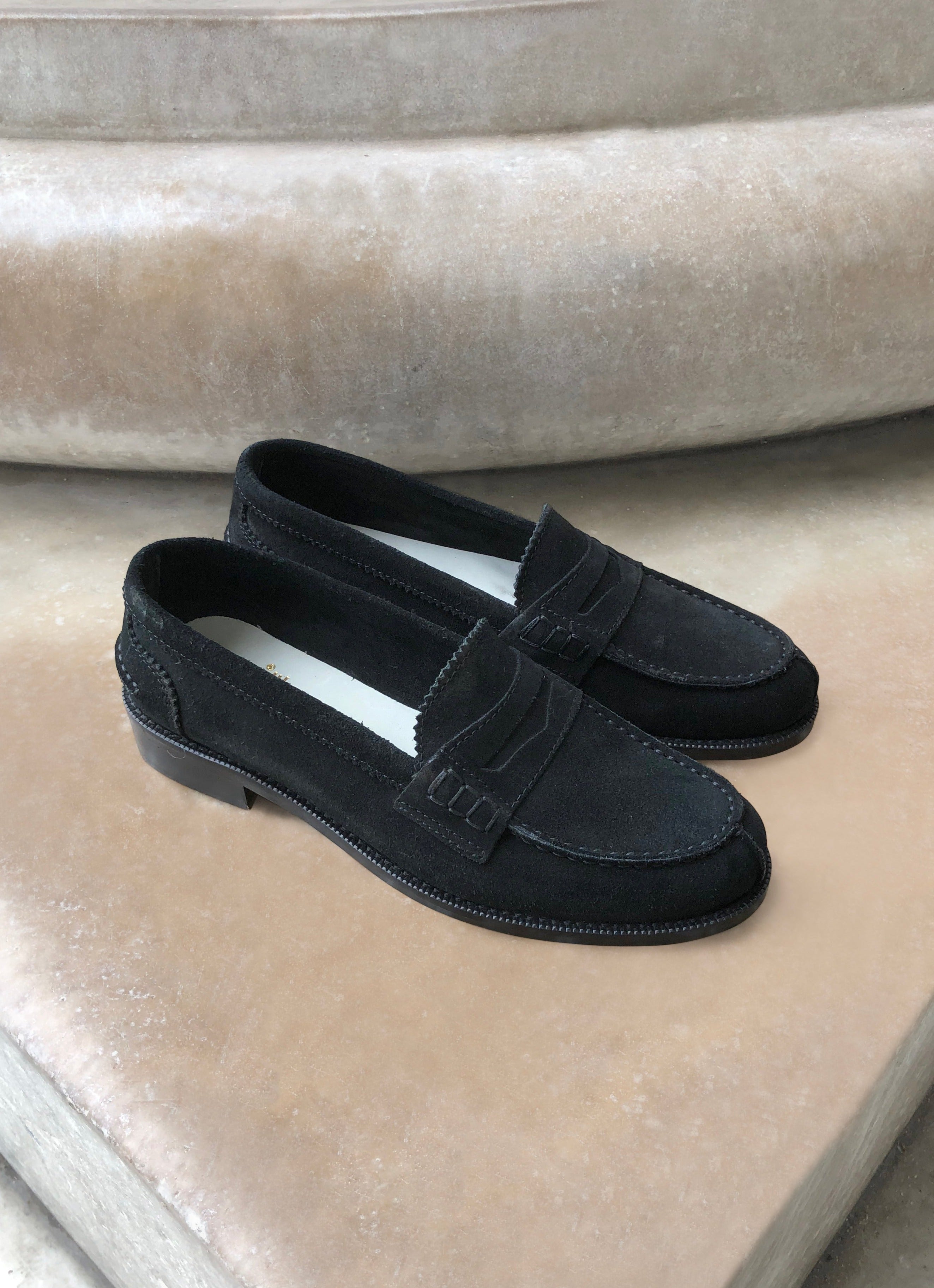 Black suede loafers