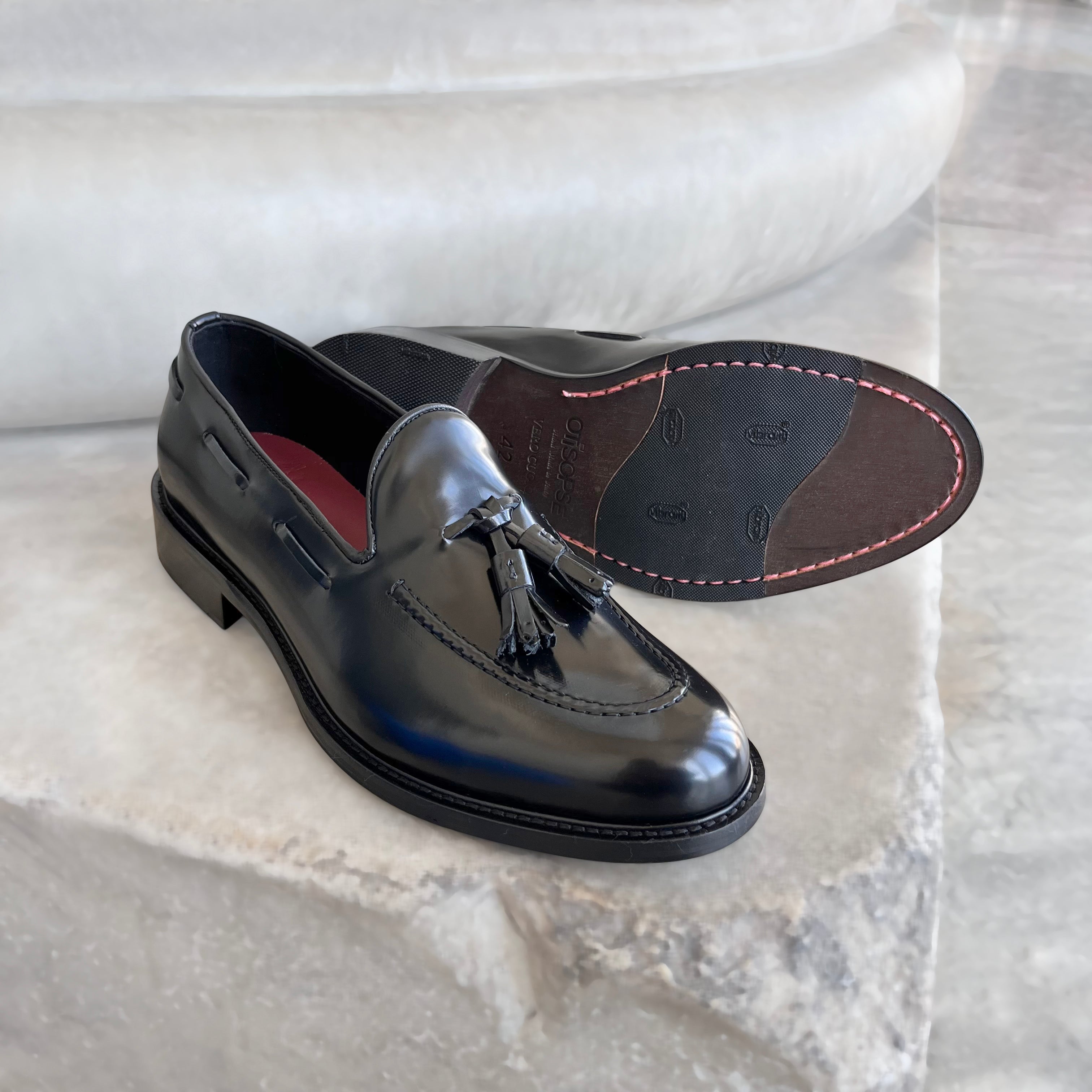 Black polished leather slippers