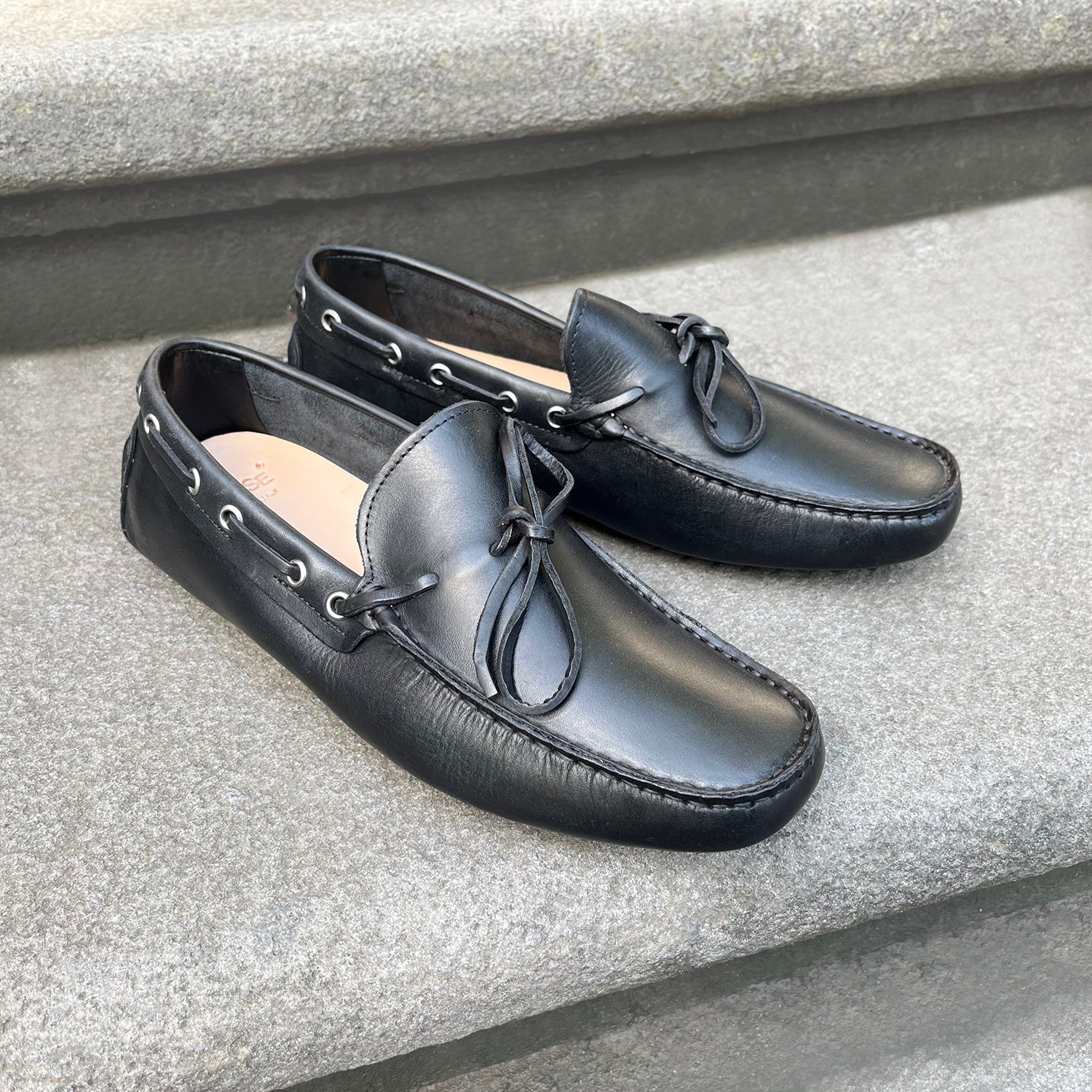 Black leather driving shoes