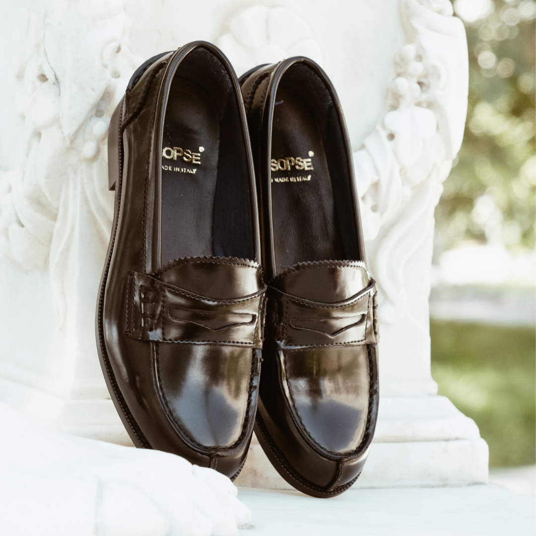 Black polished leather moccasins
