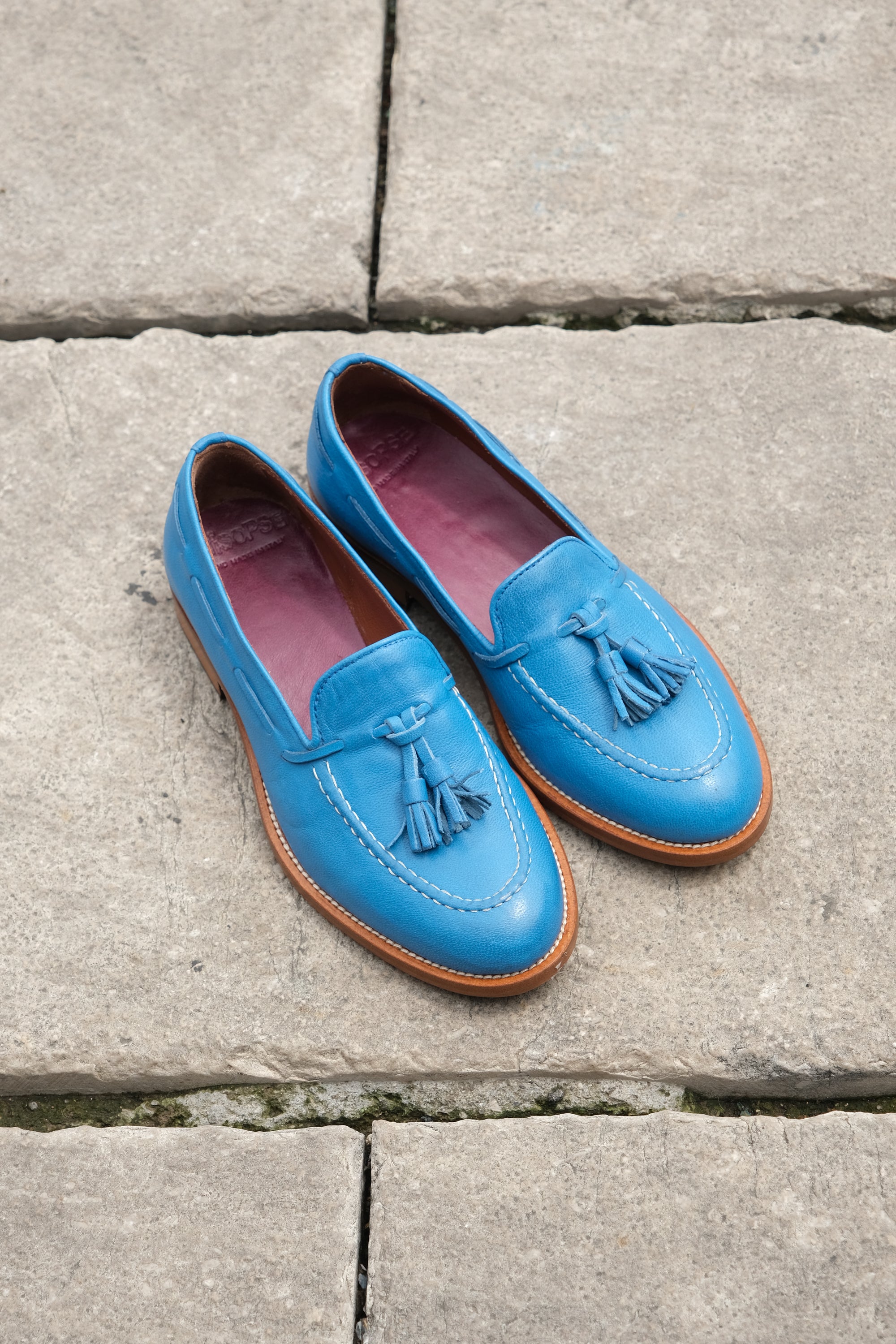 Light blue crumpled leather tassel