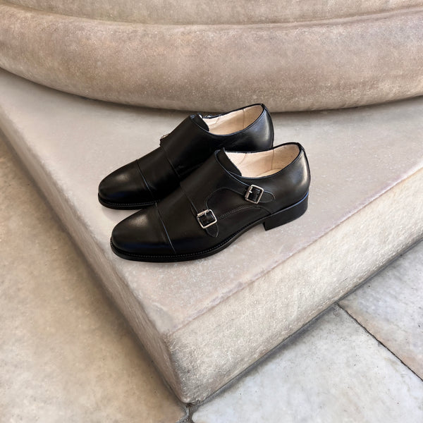 Chaussures à double boucle en cuir noir