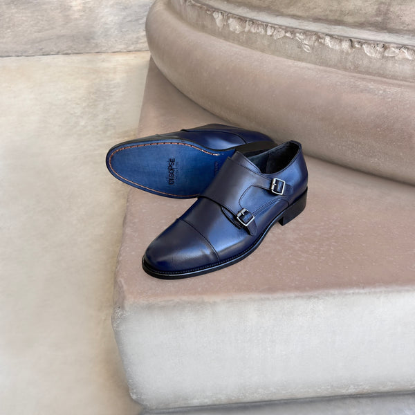 Blue leather double buckle shoes