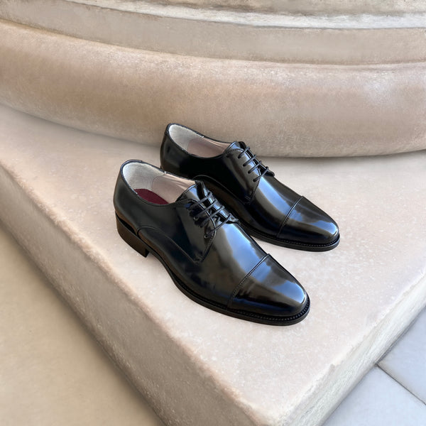 Black polished leather derby shoes