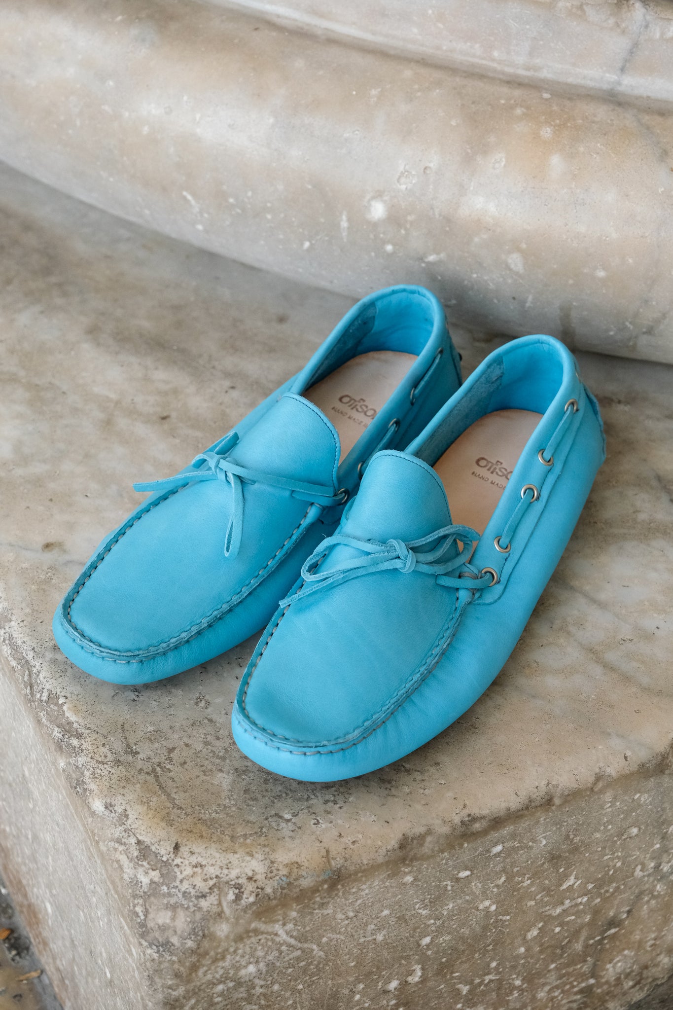 Blue leather driving shoes with rubber pads