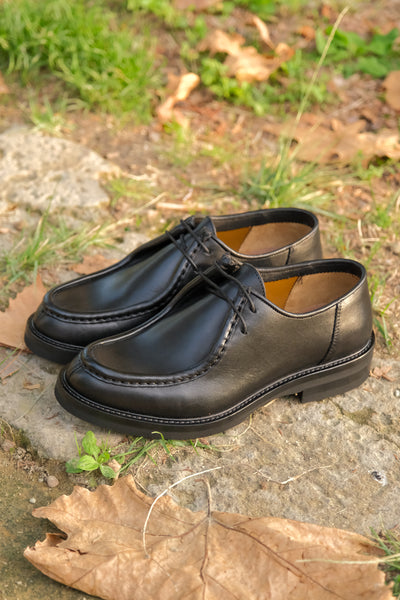 Black leather derby shoes