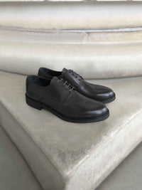 Dark brown leather derby shoes